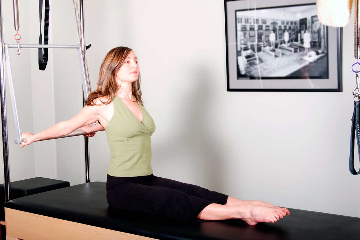 Instructor de Pilates máquina Reformer